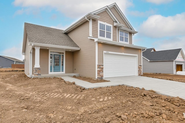 craftsman-style home featuring a garage