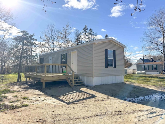 view of front of home with a deck