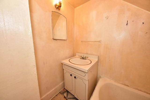 bathroom featuring a bathtub and vanity