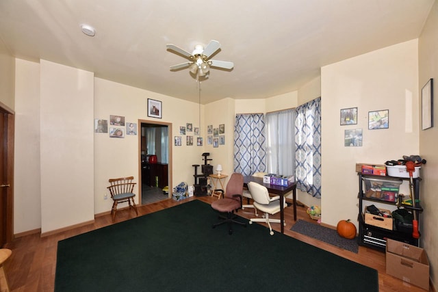 interior space with hardwood / wood-style floors and ceiling fan