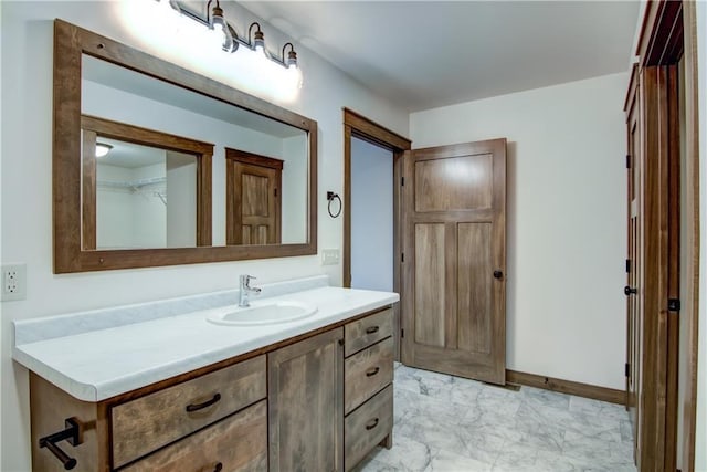1319 Carli Ct Lot 80, Chippewa Falls, WI 54729 - bathroom featuring vanity, marble finish flooring, and baseboards