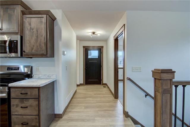 1319 Carli Ct Lot 80, Chippewa Falls, WI 54729 - entryway with light wood finished floors and baseboards