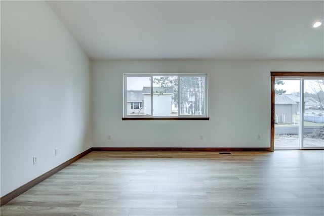 1319 Carli Ct Lot 80, Chippewa Falls, WI 54729 - empty room featuring light wood-style floors and baseboards