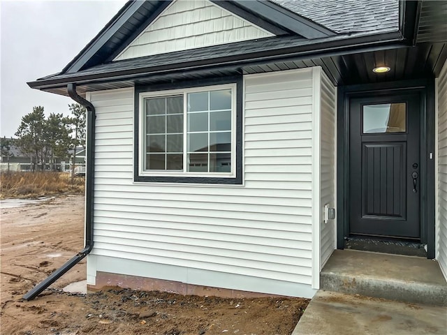 1319 Carli Ct Lot 80, Chippewa Falls, WI 54729 - property entrance featuring roof with shingles