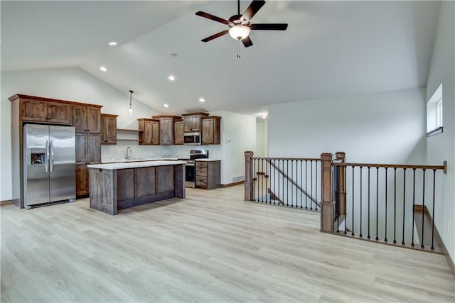 1319 Carli Ct Lot 80, Chippewa Falls, WI 54729 - kitchen featuring stainless steel appliances, light countertops, recessed lighting, ceiling fan, and a kitchen island