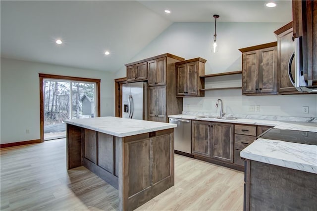 1319 Carli Ct Lot 80, Chippewa Falls, WI 54729 - kitchen featuring stainless steel appliances, a sink, lofted ceiling, open shelves, and light wood-style floors