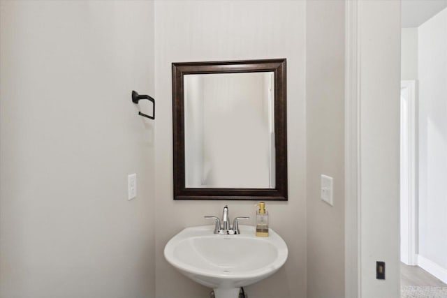 7759 Sunstone Ct, De Pere, WI 54115 - bathroom featuring a sink and baseboards