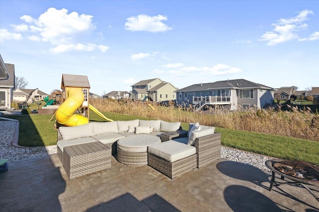7759 Sunstone Ct, De Pere, WI 54115 - view of patio featuring a residential view, an outdoor living space with a fire pit, and a playground