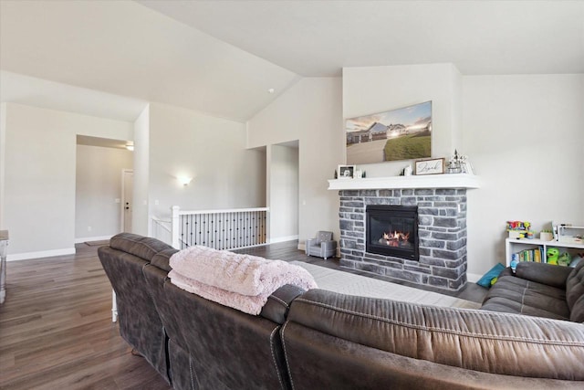 7759 Sunstone Ct, De Pere, WI 54115 - living room with wood finished floors, baseboards, a fireplace, and lofted ceiling