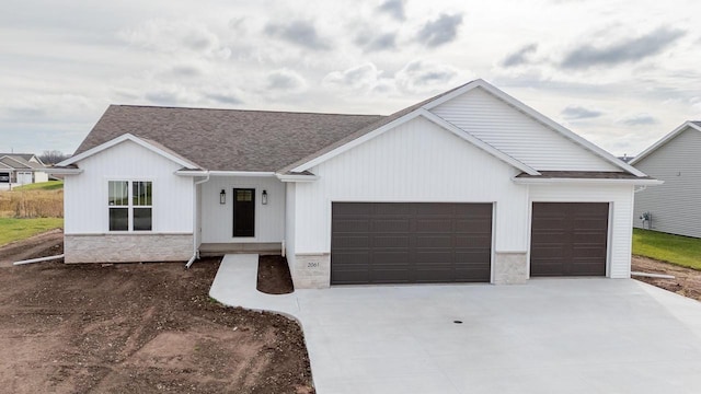 view of front of home with a garage