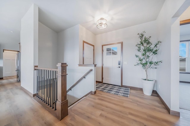 foyer with light wood-type flooring