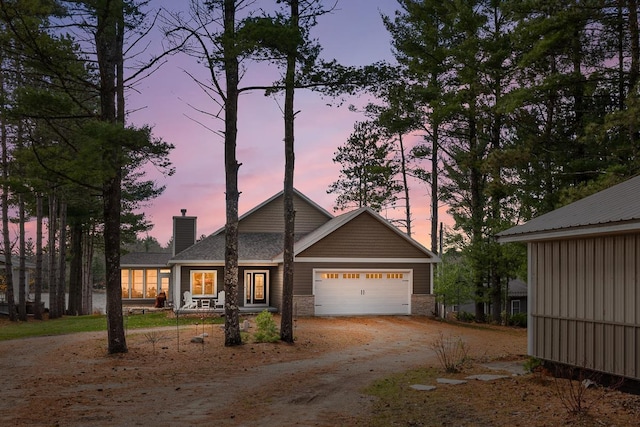 view of front of property featuring a garage