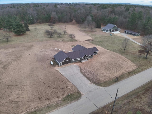 birds eye view of property featuring a rural view