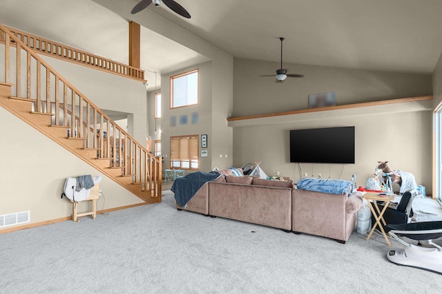 living room featuring carpet floors, ceiling fan, and high vaulted ceiling