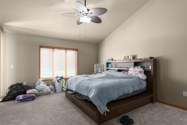 bedroom with light colored carpet, vaulted ceiling, and ceiling fan