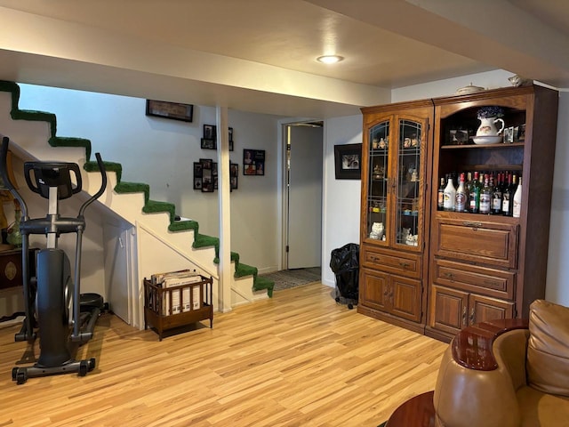 interior space featuring stairs and light wood-style floors