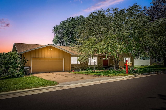 view of front of property with a garage