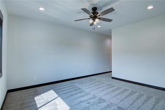 unfurnished room featuring carpet floors and ceiling fan