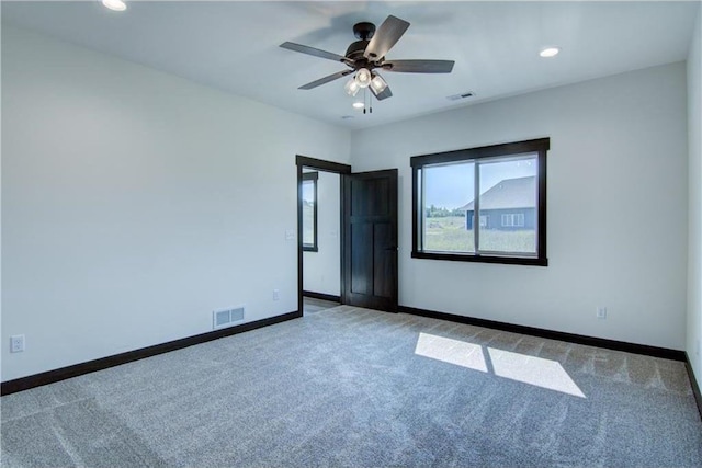 unfurnished bedroom with carpet and ceiling fan