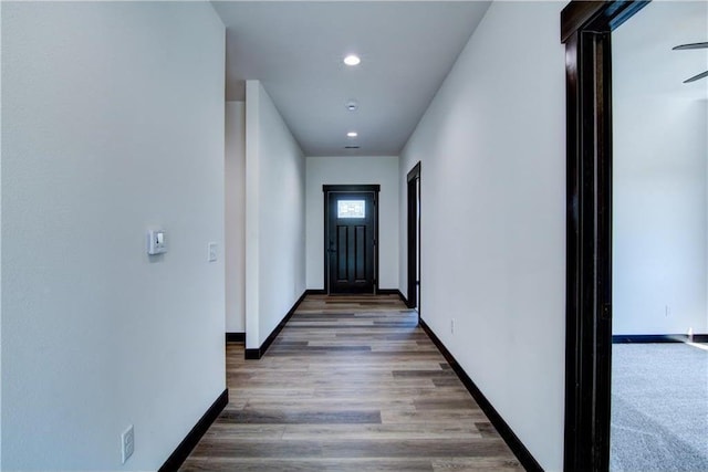 hall featuring wood-type flooring