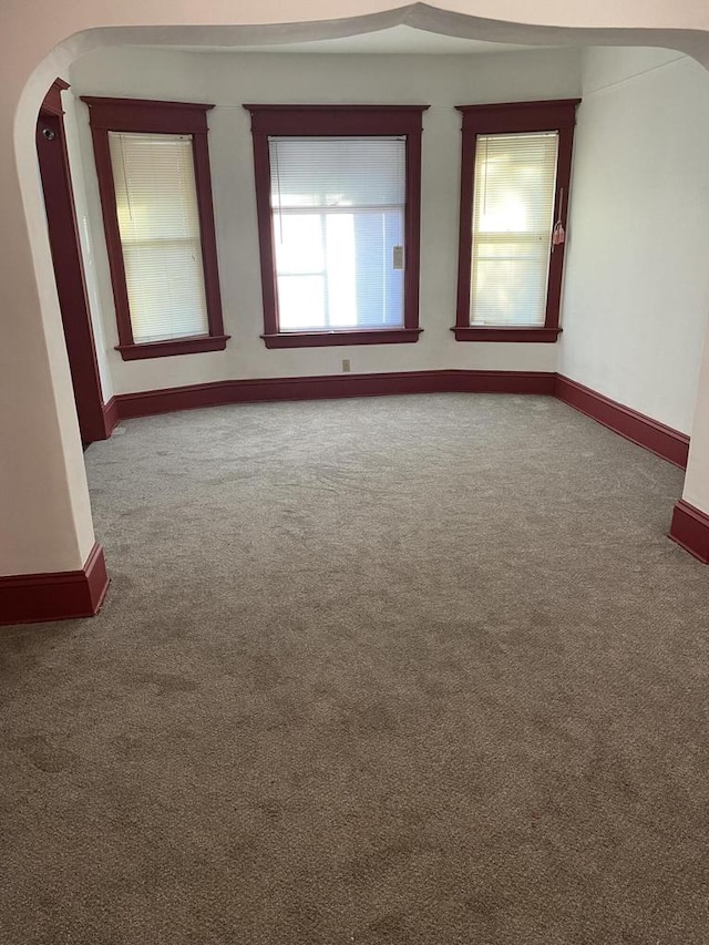 empty room featuring carpet flooring