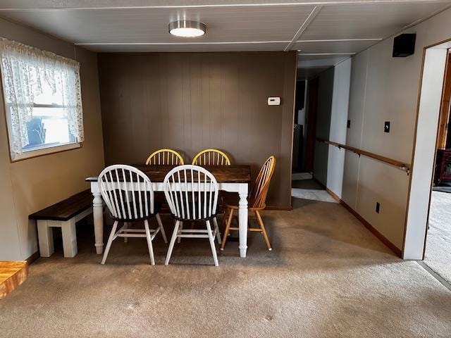 dining space with carpet floors