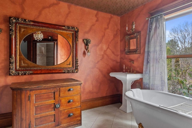 2730 Chestnut Dr, Plover, WI 54467 - bathroom with a soaking tub, tile patterned flooring, and baseboards