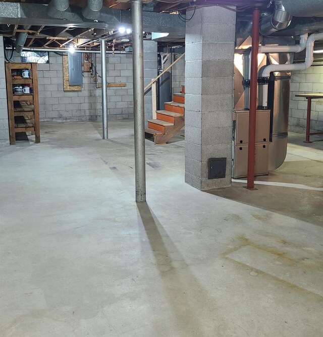 2730 Chestnut Dr, Plover, WI 54467 - unfinished below grade area with stairs, electric panel, and heating unit