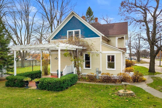 2730 Chestnut Dr, Plover, WI 54467 - victorian-style house with a pergola and a chimney