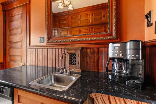 2730 Chestnut Dr, Plover, WI 54467 - kitchen with a sink, wainscoting, and tasteful backsplash