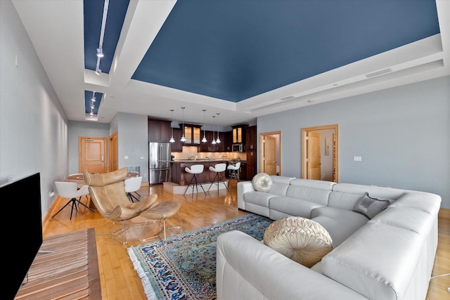 living room with light hardwood / wood-style floors