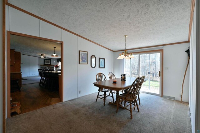 11242 S Pierce Rd, Solon Springs, WI 54873 - unfurnished living room featuring crown molding, carpet floors, a textured ceiling, ceiling fan, and lofted ceiling