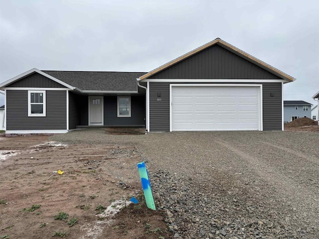 ranch-style home with a garage