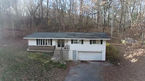 view of front of property featuring a garage