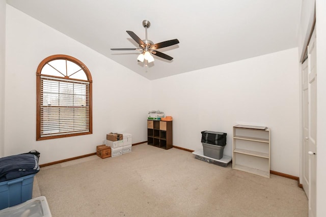 miscellaneous room with light carpet, vaulted ceiling, and ceiling fan