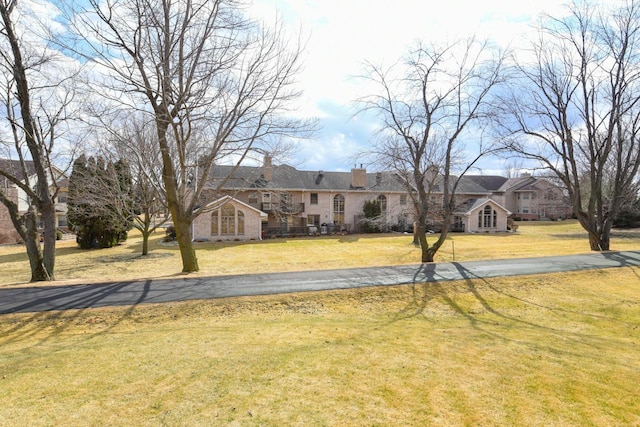 view of front of house with a front lawn