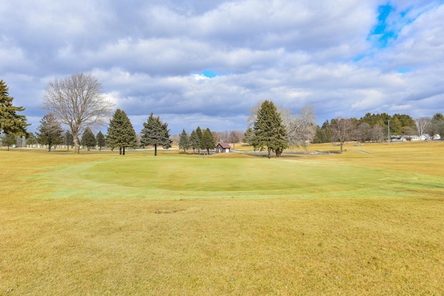 surrounding community featuring a yard