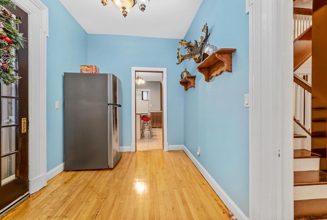 hall with light wood-type flooring