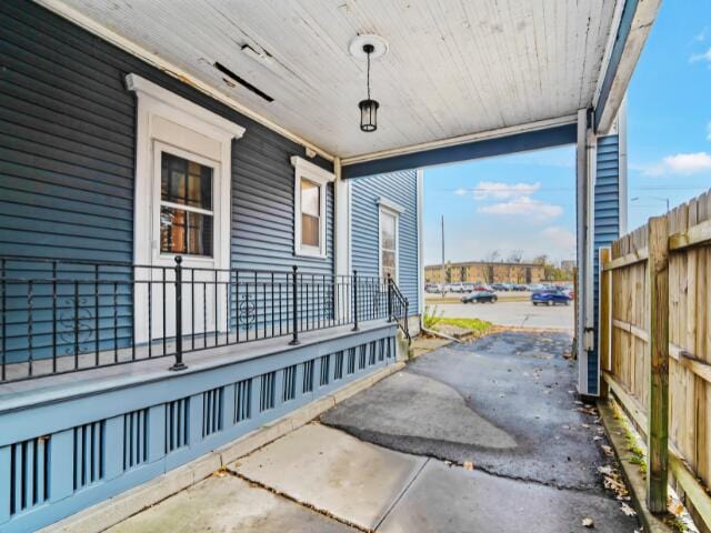 view of patio featuring a porch