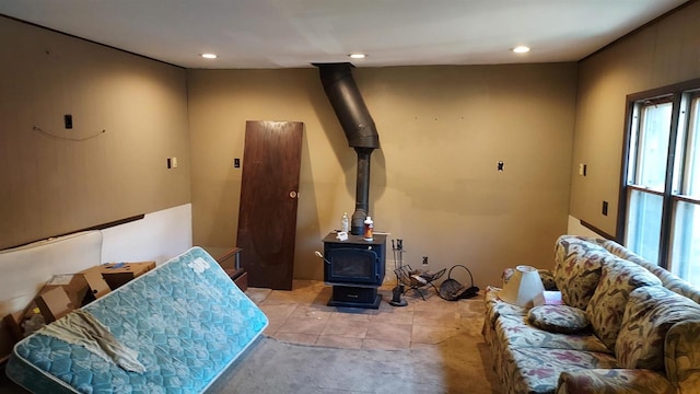 living room with a wood stove