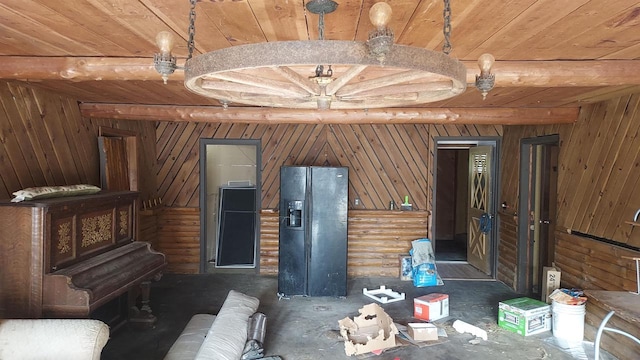 miscellaneous room with beamed ceiling, wooden walls, and wooden ceiling