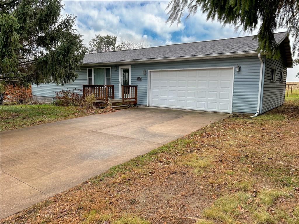 ranch-style home with a garage