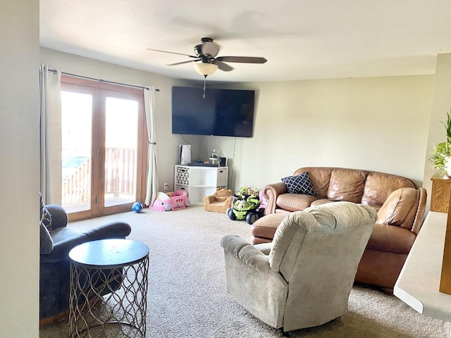 living room with carpet flooring and ceiling fan