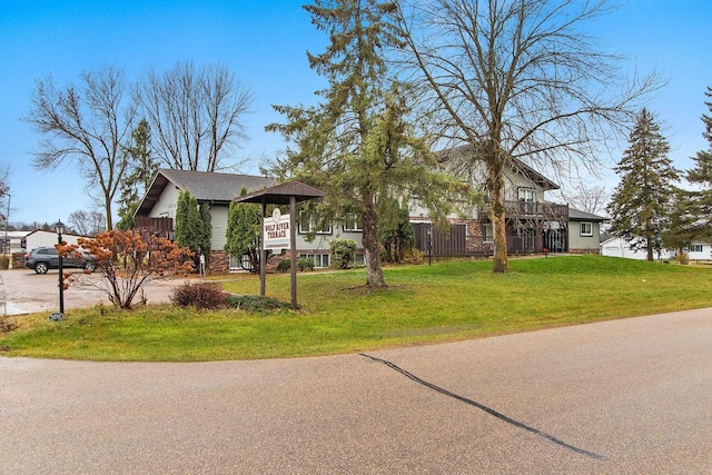 view of front of house with a front lawn