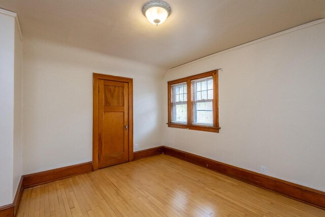 unfurnished room with light hardwood / wood-style floors