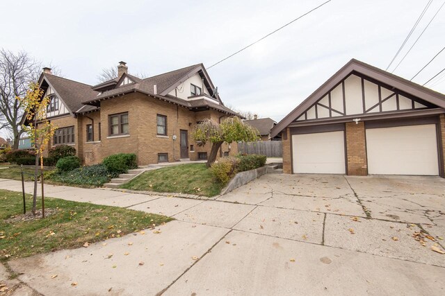 view of side of home featuring a garage