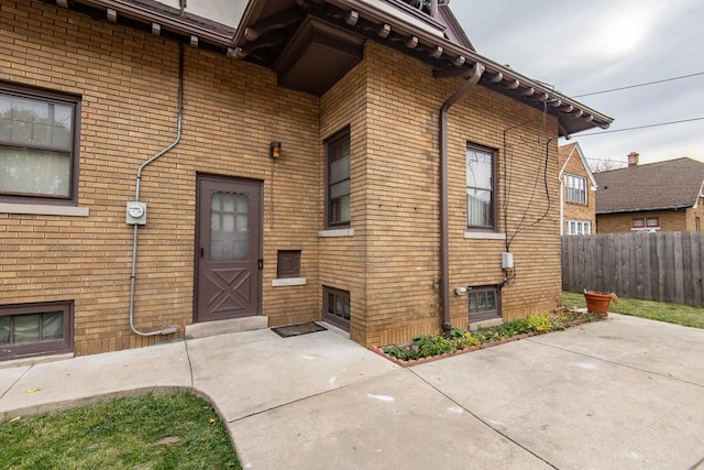 property entrance with a patio area