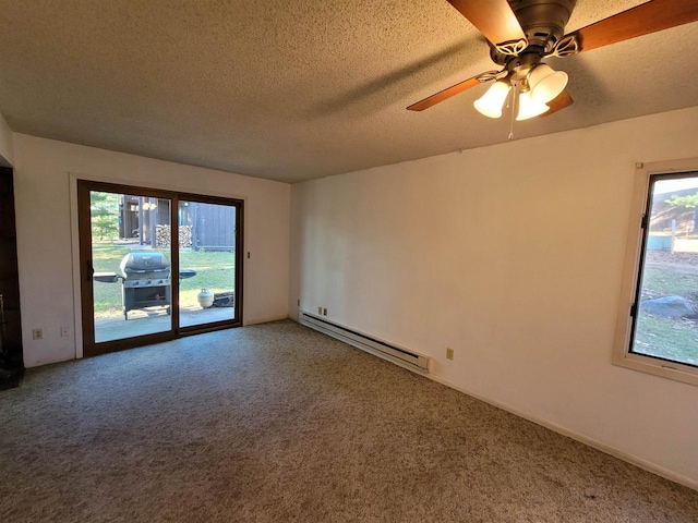 empty room featuring carpet, a textured ceiling, baseboard heating, and ceiling fan