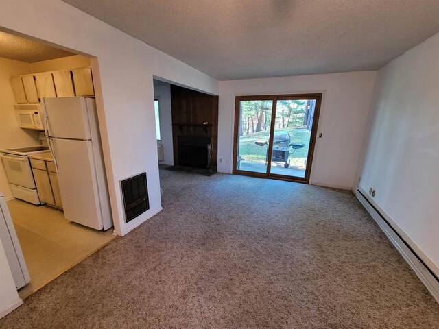 1 Aspen Trl Unit 1, Wisconsin Dells, WI 53965 - unfurnished living room with a baseboard heating unit, light colored carpet, a textured ceiling, and a fireplace