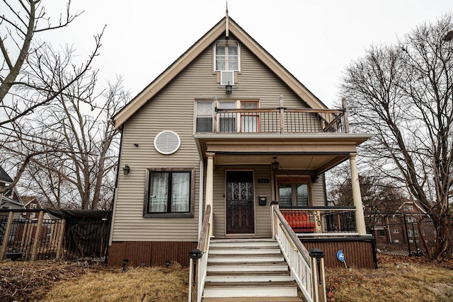 330 E Locust St, Milwaukee, WI 53212 - view of front of home featuring a balcony and a porch
